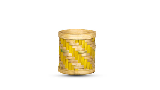 A handcrafted bamboo pen/pencil/paint brush holder with a geometric pattern.