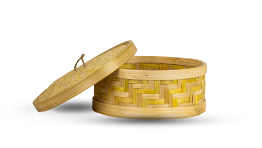 A handcrafted bamboo chapati/snacks box with lid, in an open position, displaying the woven pattern and natural color of the bamboo.