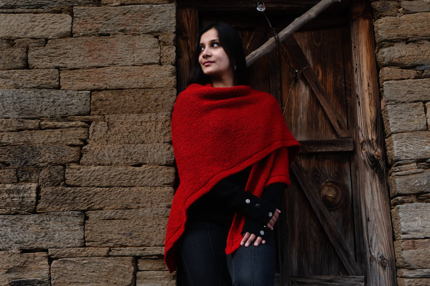 Textured handknitted shawl rustic background