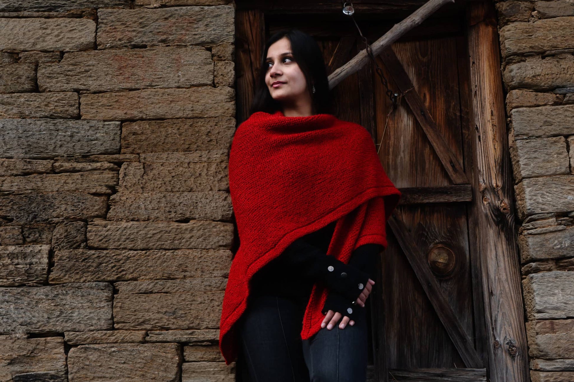 Textured handknitted shawl rustic background