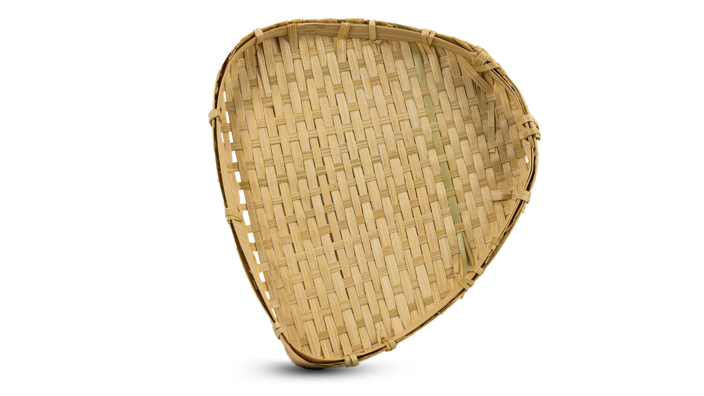 Triangular fruit tray with rounded edges on a white background with shadow