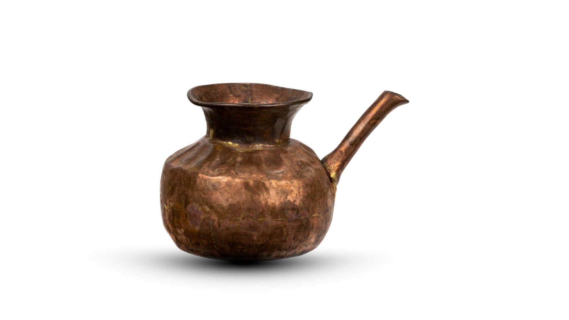 Handcrafted copper pot from Almora in white background for decorative or Puja purposes.