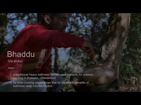 Video of cooking in a Bhaddu. Outdoor cooking on a wood open fire in a mud clad Bhaddu